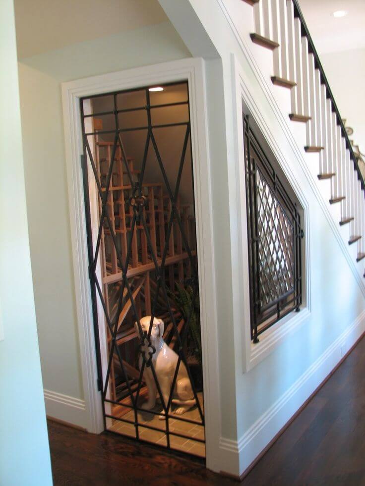 Under stairs dog outlet kennel door